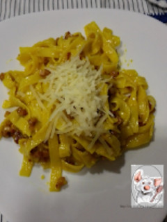 Una foto de Tallarines a la Carbonara