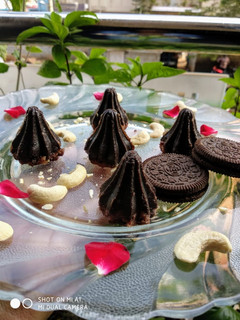 A picture of Oreo and dry Fruits Modak.