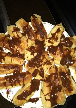 Una foto de ECLAIRS Rellenos de crema pastelera 👏