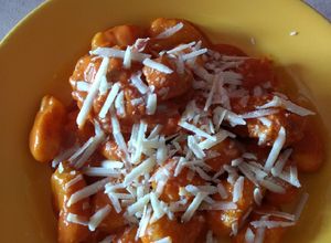 Una foto de Ñoquis de calabaza y papas (podría ser zanahorias, batatas, etc)