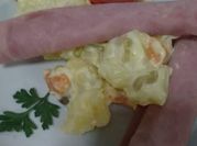 Una foto de papa con jamón serrano