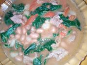 Una foto de acelgas con frijoles