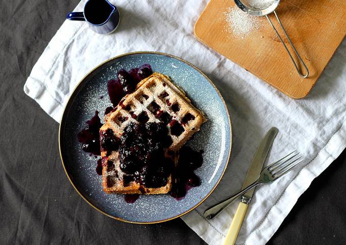 Vegan waffles with warm blueberry and maple syrup compote