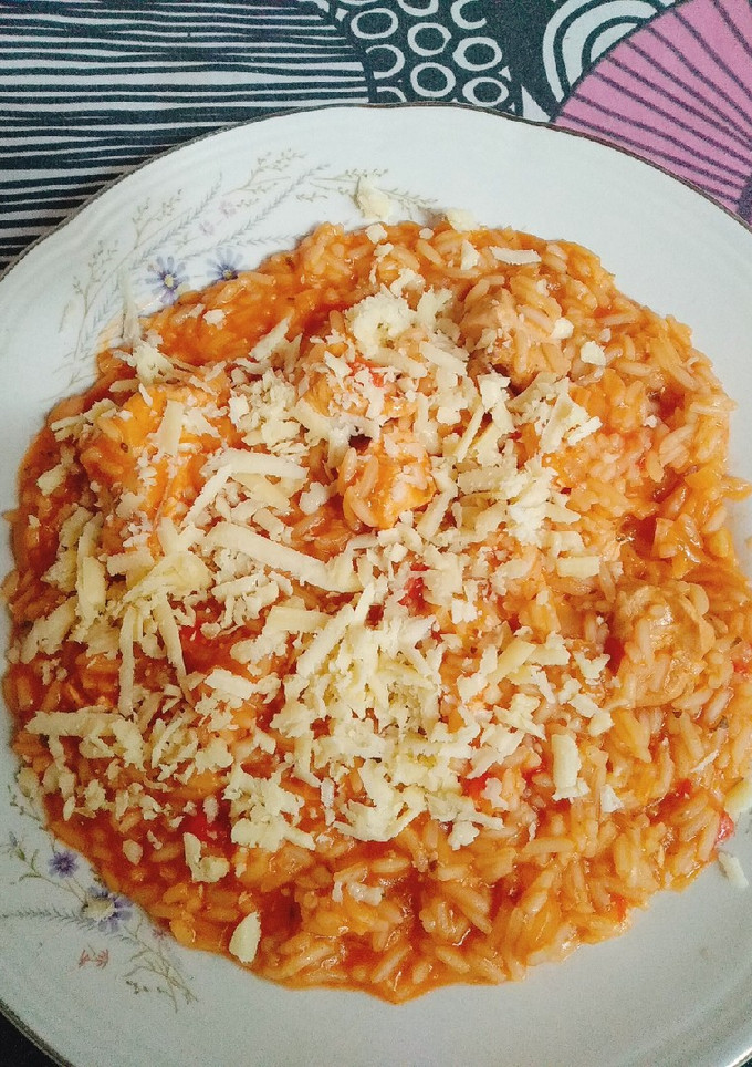 Una foto de Guiso de arroz con pollo ♥️