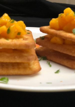 A picture of Mango salsa crackers.