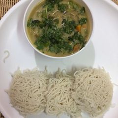 A picture of Idiyappam and Vegetable Kurma.