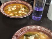 Una foto de caldo de queso