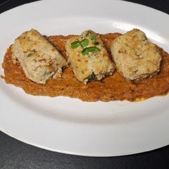 Toffu with dip makhni gravi A picture of Toffu with dip makhni gravi.