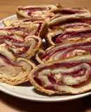 Rollo de jamón cocido de ternera y queso al horno