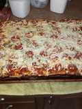 Homemade pizza. Q man chews style
