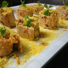 Cabbage stuffed chapati rolls A picture of Cabbage stuffed chapati rolls.