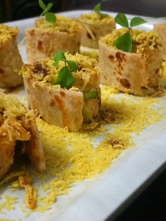A picture of Cabbage stuffed chapati rolls.