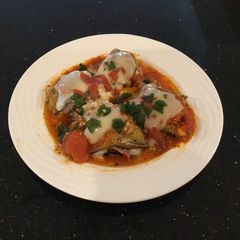 A picture of Eggplant Rolled with Ham and Cheese.