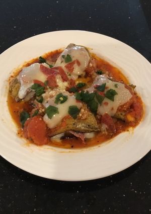 A picture of Eggplant Rolled with Ham and Cheese.