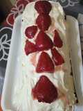 Pionono relleno de crema y frutillas