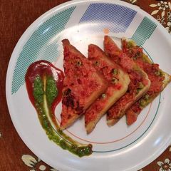 A picture of Mixed veg bread Besan suji toast.
