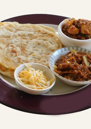 A picture of CHEESY MULTI GRAIN FLAT BREAD/NAAN.