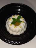 Panna cotta con coulis de piña