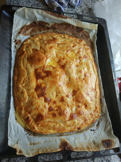 Una foto de Empanada de pollo al curry