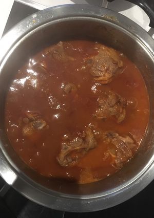 A picture of Mutton curry and baked beans.