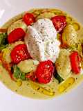 Gnocchi su Salsa di Mozzarella di Bufala e Basilico con Pomodorini Fiori di Zucca e Stracciatella