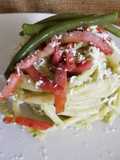 Bucatini con crema di fagiolini, mascarpone e speak croccante