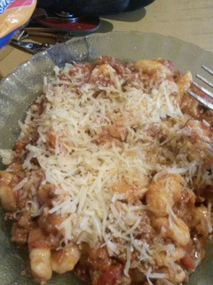 Una foto de Ñoquis de papa con salsa bolognesa