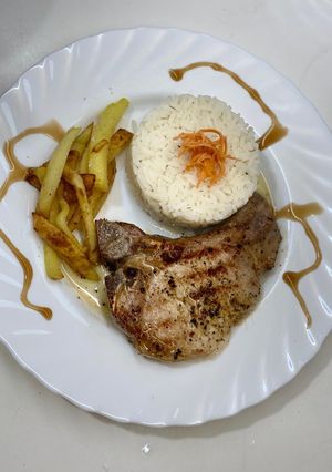 Una foto de Chuletas de Cerdo a la Plancha al Eastwood