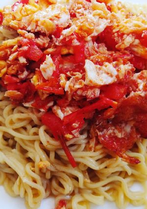 A picture of Indomie Noodles with Fried Eggs #noodlesrecipecontest.