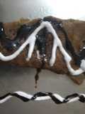 Jaggery pancake with chocolate syrup