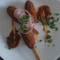 A picture of Chicken popsicles.