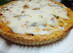 Una foto de Tarta de zapallitos, zanahoria y berenjena con masa casera