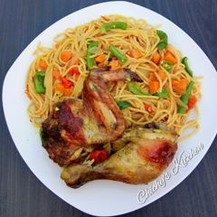 A picture of Spaghetti and veg stir fry.