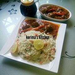 A picture of Burabiskon shinkafa/corn meatballs sauce.