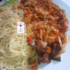 A picture of Spaghetti with vegetable sauce.