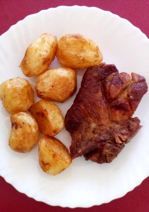 A picture of Pork Collar Steak & Potatoes.