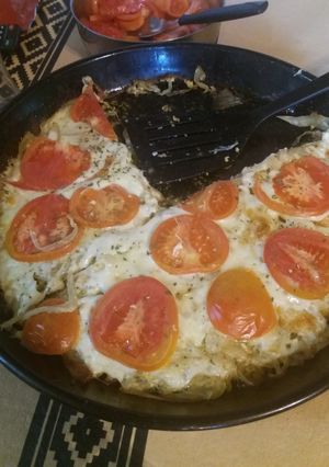 Una foto de Pizza de cebolla (sin harinas)