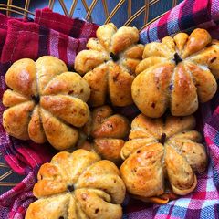 A picture of Pumpkin shaped pizza pockets.