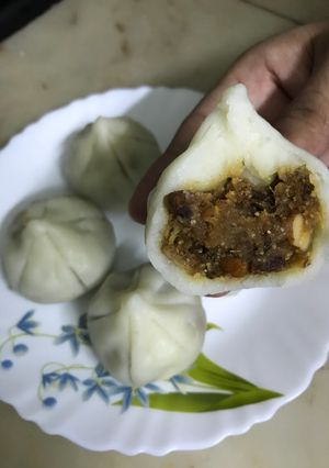 A picture of #Modak|Dates|Dry fruits.