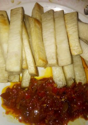 A picture of Fried yam and stew.
