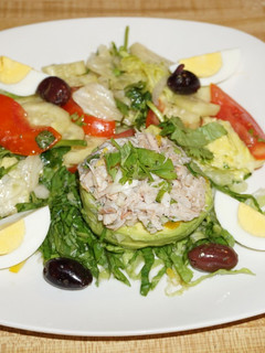 A picture of STUFFED AVOCADO WITH CRAB MEAT SALAD, JON STYLE.