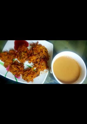 A picture of Kandha bhajia with ginger masala tea.