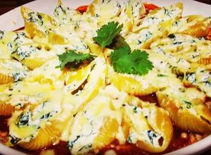 Foto de Conchiglione Recheado de Ricota, Espinafre, Parmesão e Gratinado com Mussarela