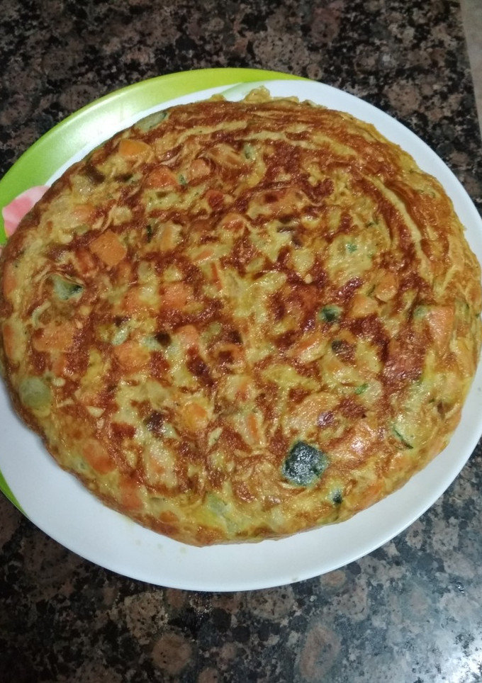 Una foto de Tortilla de boniato, puerro y calabacín