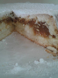 Una foto de Tarta de ricota y dulce de leche