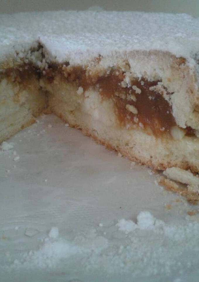 Una foto de Tarta de ricota y dulce de leche