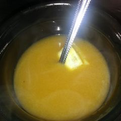 A picture of Chicken bone broth w/ thyme & lemon.