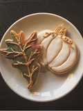 Pumpkin spiced sugar cookies and royal icing