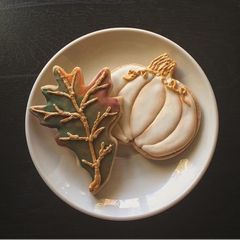 A picture of Pumpkin spiced sugar cookies and royal icing.