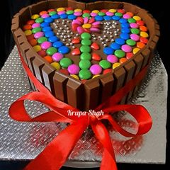 A picture of Kitkat gems chocolatey cake (no maida).